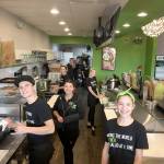 Employees at The Chopped Leaf prepare fresh ingredients for the restaurants bowls, salads and wraps. Courtesy Kevin Dueck