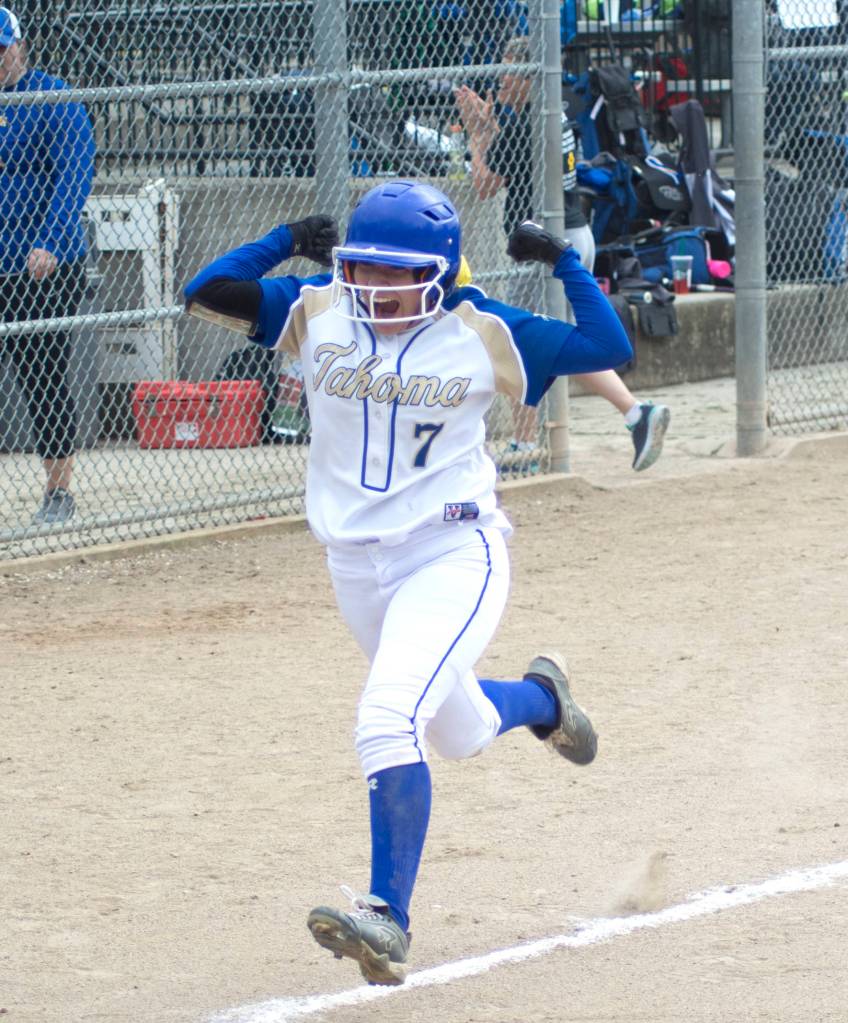 The Tahoma Bears opened district play Friday with a 11-1 win over Todd Beamer. The girls will compete at state beginning today, May 25. Photos by Kayse Angel