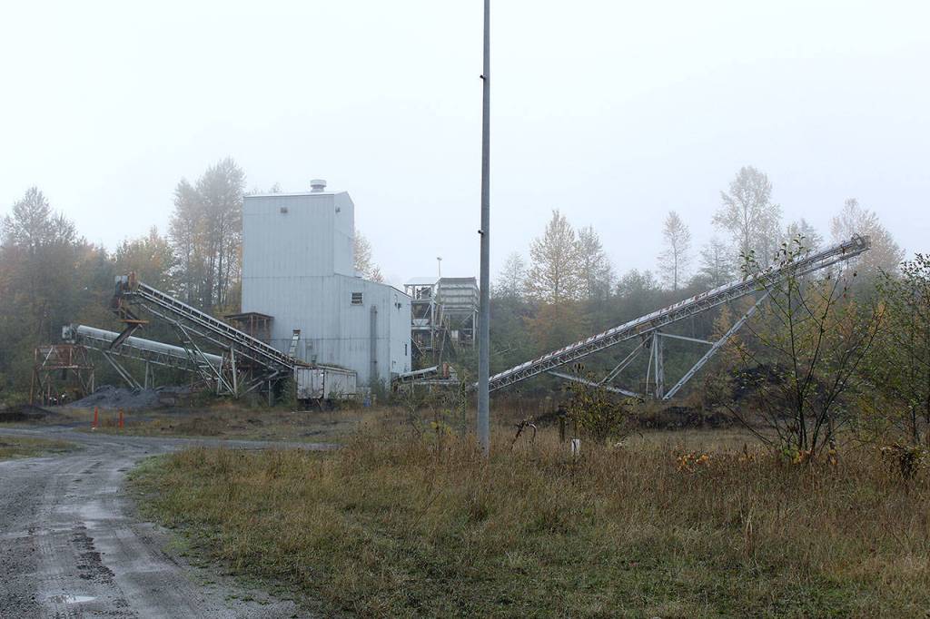 After the coal at the John Henry Mine is mined, the material is put through two crushers and separated  coal is put out on the right, while refuse exits to the left. Photo by Ray Still
