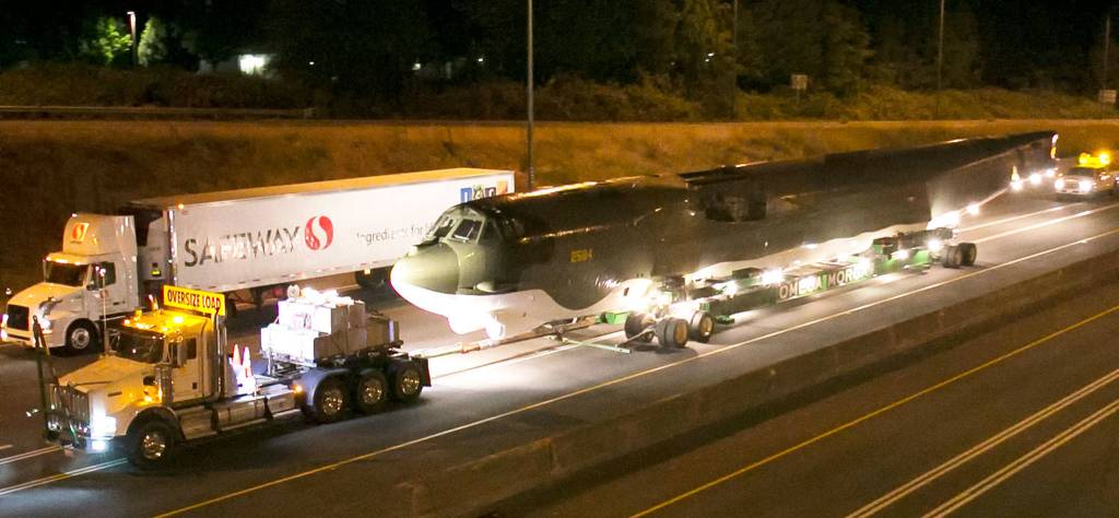 The B-52 Midnight Express is towed along I-405 while en route from Paine Field in Everett to the Museum of Flight at Boeing Field in Seattle early Sunday morning. (Kevin Clark / The Herald)