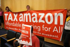 The public files into the City Council Chambers to voice their opinions prior to the vote to repeal the head tax. Photo by Melissa Hellmann