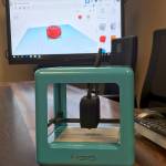 The 3D printer that Nathanael Junkin used to make the missing piece for the Covington Community Park Gate. Also displayed is the computer program he used. Photo by Kayse Angel