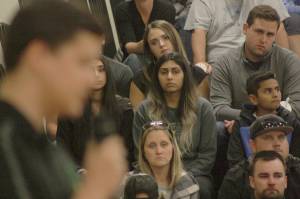 The crowd listens in and looks on as Kentridge senior-to-be Adrian Tirtu, the ASB president, talks about Eric Anderson, the schools longtime athletic director who passed away at age 57. MARK KLAAS, Kent Reporter