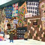Photo by Kayse Angel                                Quilts the Covington Quilters Guild made for different organizations hang on display at the 2018 Quilt Show.