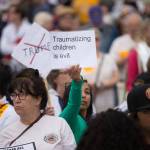Protesters gather at SeaTacs Families Belong Together rally. Photo by Alex Garland