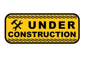 Hardhats and heavy equipment continue to dot school grounds