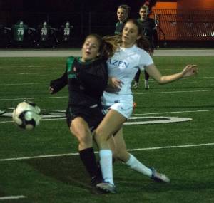 Photo by Kayse Angel                                Hazen and Kentwood battled it out Tuesday in Covington. The Conquerors scored a late goal to win the match 1-0. The loss is Hazens first of the season.
