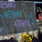 Students made a sign to display at the last home Tahoma football game on Sept. 21 to honor the death of their fellow students who have died. Photo by Kayse Angel