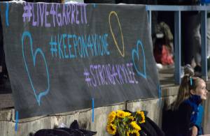 Students made a sign to display at the last home Tahoma football game on Sept. 21 to honor the death of their fellow students who have died. Photo by Kayse Angel