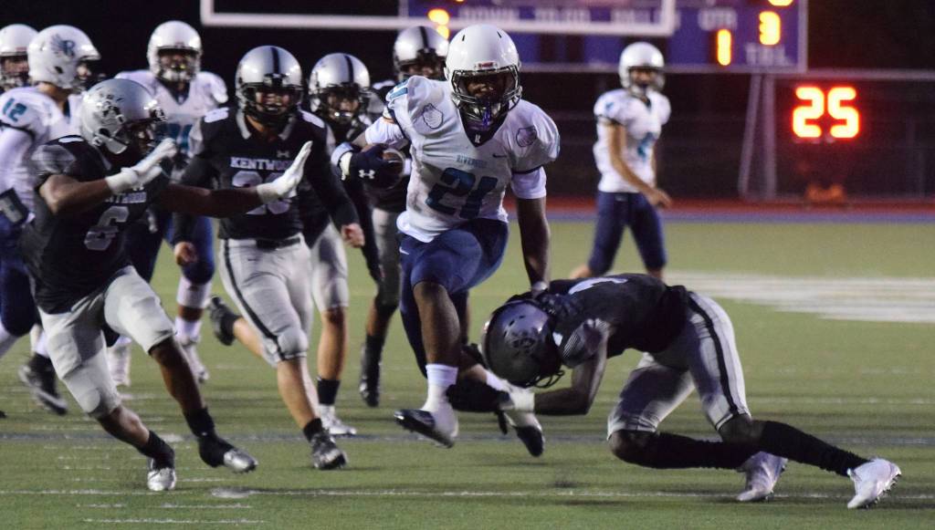 Auburn Riverside Jayden Solis bursts up the middle to score on a 29-yard run in the first quarter against Kentwood on Thursday night. RACHEL CIAMPI, Kent Reporter