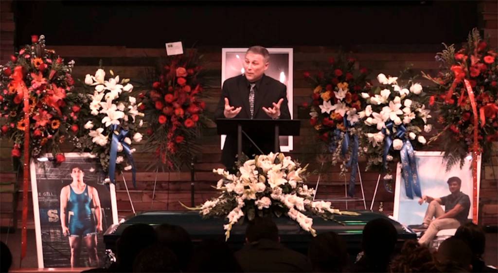 Image courtesy Enumclaw School District                                Greg Daulton, lead pastor at Mount Rainier Christian Center, led Kione Gills memorial service Sept 17. The service was recorded, and the Enumclaw School District has produced a video with clips from the service to promote the upcoming suicide prevention event.