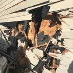 Driver loses control of car, crashes into townhouse