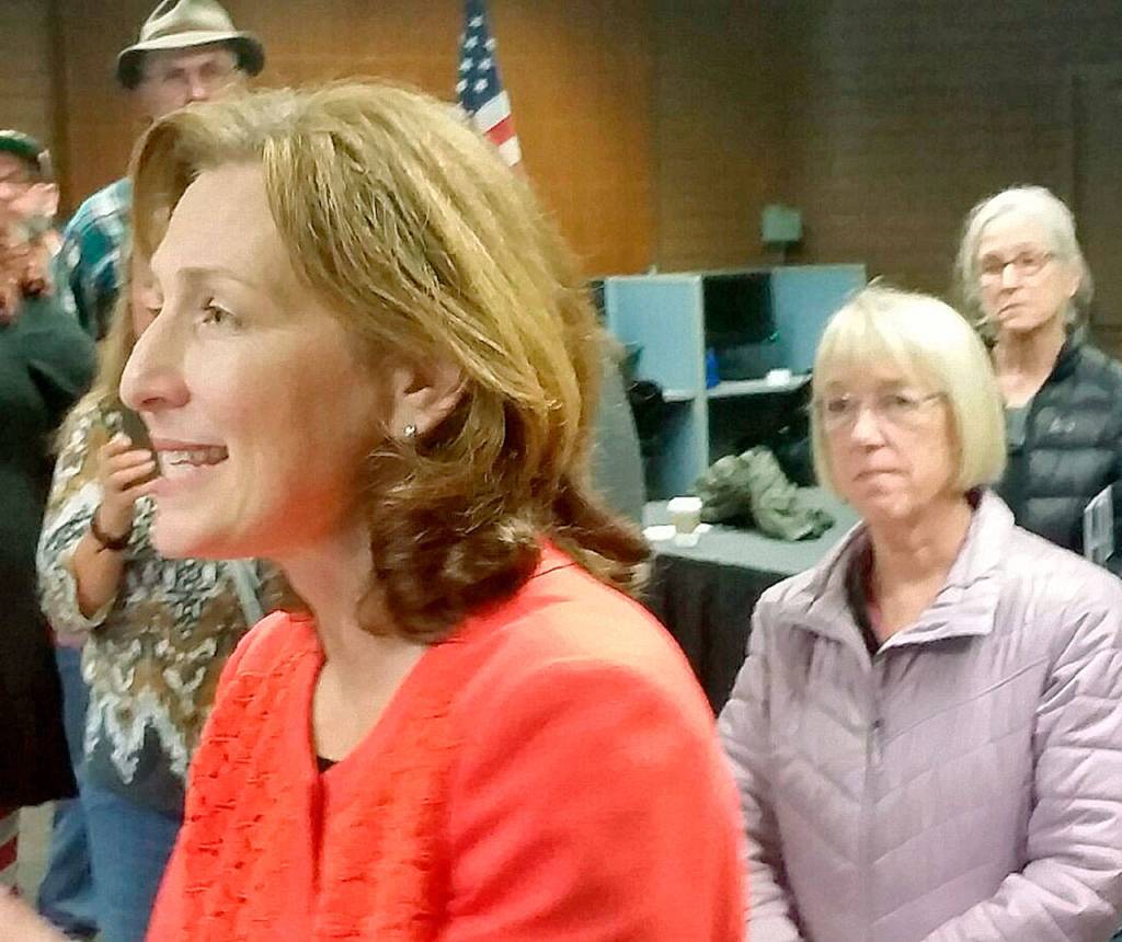 Democratic candidate Dr. Kim Schrier, locked in a tight race with Republican Dino Rossi for the U.S. 8th Congressional District seat, talks to campaign volunteers as U.S. Sen. Patty Murray listens behind her at the Aerospace Machinists Hall in Auburn on Monday afternoon. ROBERT WHALE, Auburn Reporter