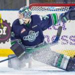 COURTESY PHOTO, Brian Liesse, T-Birds                                Thunderbirds goalie Liam Hughes anticipates a shot during WHL play against Portland on Saturday night.