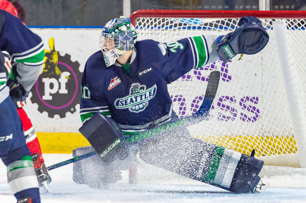 COURTESY PHOTO, Brian Liesse, T-Birds                                Thunderbirds goalie Liam Hughes anticipates a shot during WHL play against Portland on Saturday night.