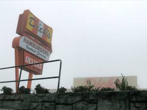 The new Dicks Drive-In off Pacific Highway South in Kent stands shrouded in the Tuesday morning fog as construction nears full completion before its Dec. 12 grand opening. REPORTER PHOTO
