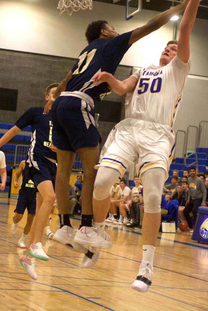 Tahoma senior Kimball Cottam goes up for a shot during Tuesdays win over Todd Beamer. Photos by Kayse Angel
