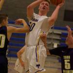 Tahoma senior Kimball Cottam goes up for a shot during Tuesdays win over Todd Beamer. Photos by Kayse Angel