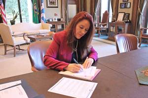 Washington Secretary of State Kim Wyman certifies the results of the 2018 General Election in Olympia on Tuesday, Dec. 4. Courtesy Office of the Secretary of State