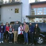 Courtesy photo                                Councilmember Reagan Dunn poses with Vine Maple Place staff members after delivering the keys to a retired Metro van.