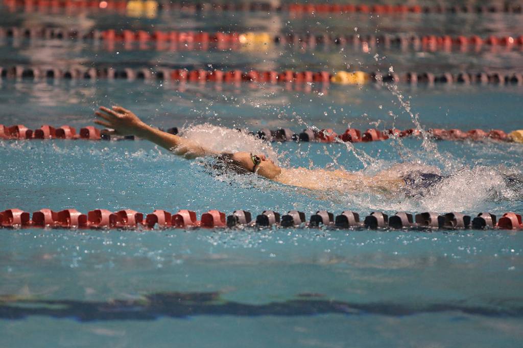 Kentwood sophomore Ben Stanton swims to victory in the 50-yard backstroke final during the 4A state championships at the King County Aquatics Center in Federal Way on Saturday. Stanton captured the title with a time of 32.86 seconds. He also finished second in the 50 freestyle in 26.82. Courtesy photo by Tracy Arnold