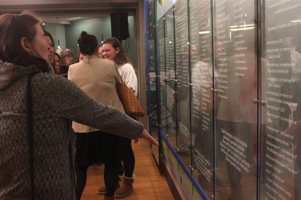 Multicare staff members and others gathered on Feb. 26 to celebrate the unveiling of the new donor wall that honors those who have donated to the South King Health Foundation campaign, which funded a reflection room for Covington MultiCare.