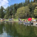 Fishing boats sit on the shore of Lake Wilderness during the Hooked On Fishing Derby. Photo by Kayse Angel