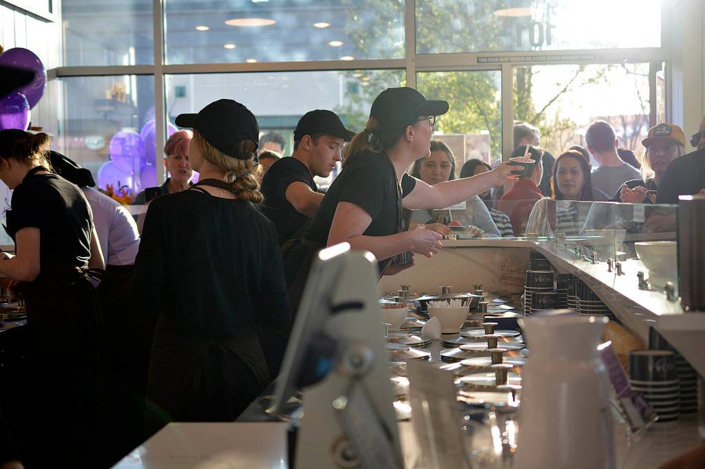 Customers line up to get their hands on Mora ice cream during the Mora Iced Creamery grand opening, which took place on April 24. Photo by Kayse Angel