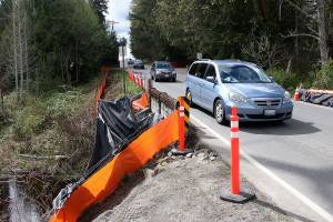 A pedestrian bridge is being installed on Black Diamonds Rock Creek Bridges south side, which will allow foot traffic to cross the bridge more safely. Some concerns were raised about the project being exempt from the states SEPA process  maybe especially because Rock Creek is a salmon-bearing bridge  but erosion control and debris mitigation measures have been set up. Photo by Ray Miller-Still