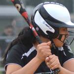 A Kentwood softball player steps up to the plate during the April 25 game against Kentridge.
