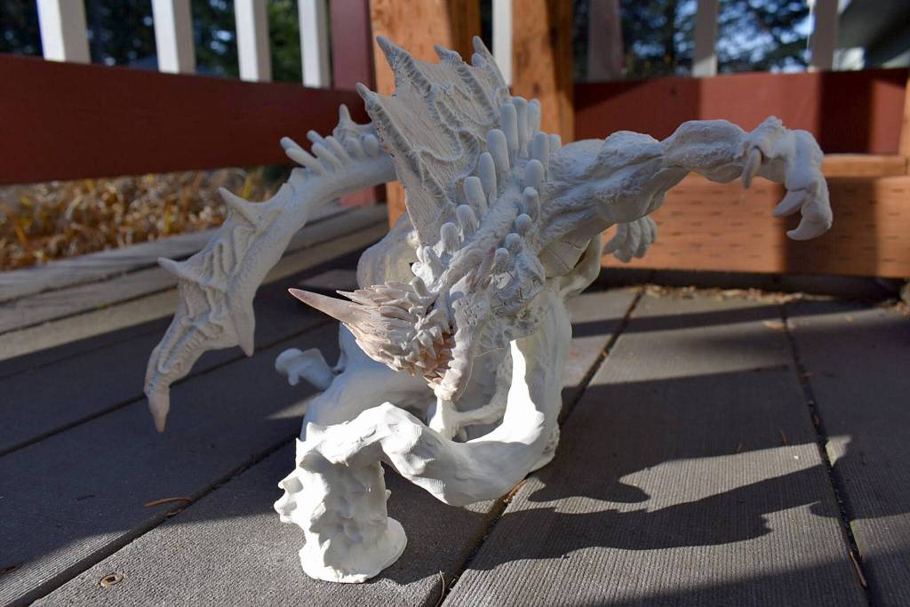 Tahoma student Kaleb Jaelan Magees piece of art that he submitted in the 2019 Regional High School Art Show. Left, Magee poses with his awards that he won in the 2019 Regional High School Art Show. Submitted photos from Jonalyn Magee