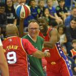 Two Harlem Wizards play keep away with the ball from one of the Tahoma staff members during the fundraising event that took place on May 3 at Tahoma High School. Photo by Kayse Angel