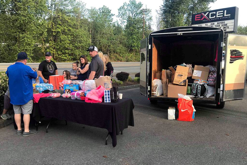 Community members gathered on May 6 to collect goods for the Dodge family whos house caught on fire on May 4. Submitted photo from Amy Harrison White