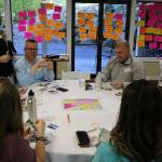 Community members talk about what they think the future of Maple Valley Town Center should be at the special meeting on May 6.