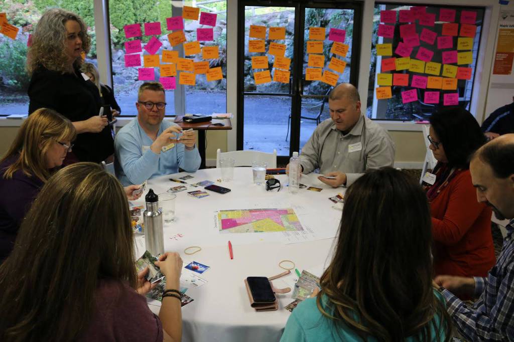 Community members talk about what they think the future of Maple Valley Town Center should be at the special meeting on May 6.