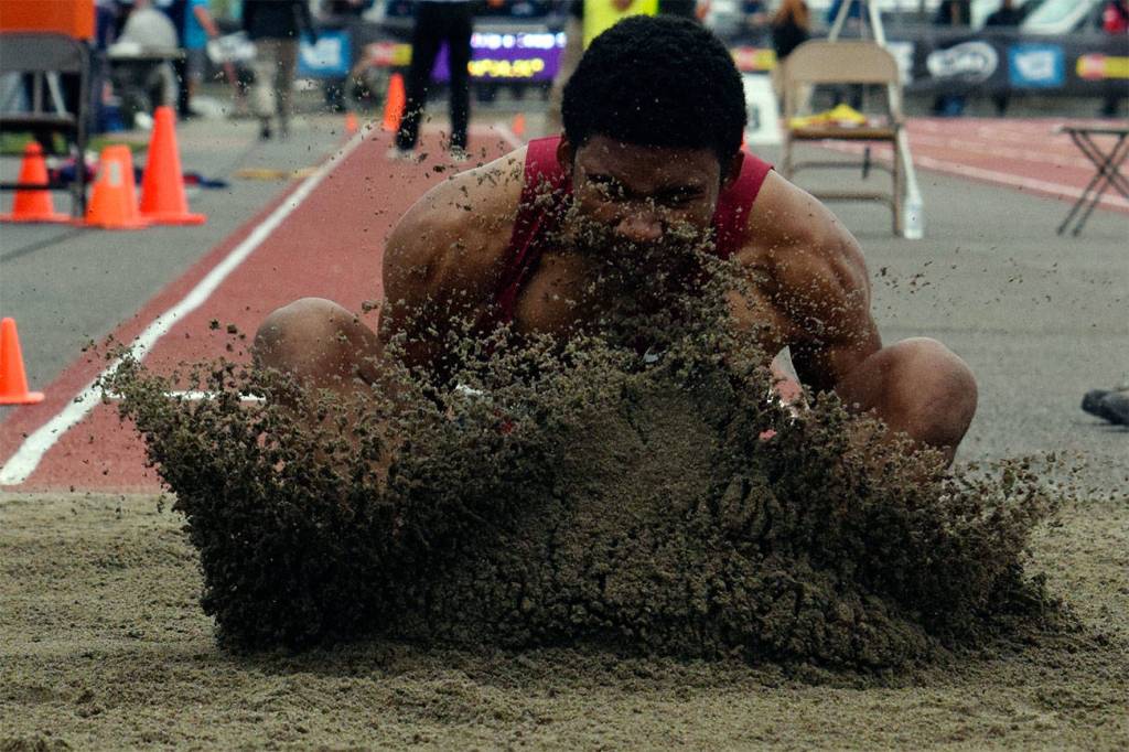Photo courtesy of Rachel Ciampi.                                Kent Lake High Schools Justice Efato does the long jump and wins the Washington State Track and Field Championship on Saturday, May 25.