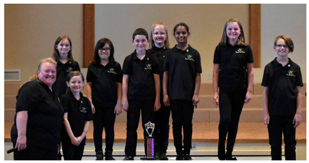 Submitted photo                                 Pictured left to right: Karen Martin, Primo Voce instructor and Kent Elementary Music Specialist; Nelli Southwick, Covington Elementary; Sophia Dermody, Sunrise Elementary; Elizabeth Ollom, Martin Sortun Elementary; Dennis Mottern, Covington Elementary; Isabelle Paxton, Sunrise Elementary; Irene Biju, Sherwood Forest Elementary, FWSD; Holly Johnson, Maple Valley homeschool; and Taylor Roy, Lake Youngs Elementary. Not pictured is Latin Wombles,Grass Lake Elementary.