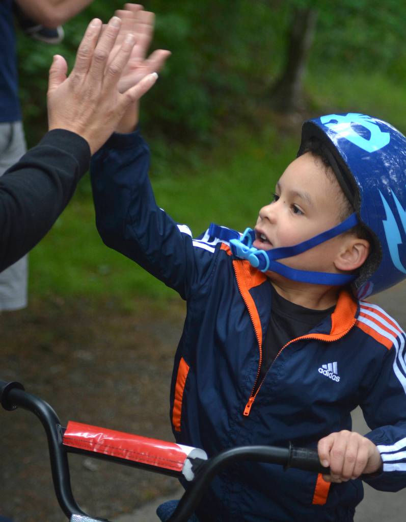 Photos by Kayse Angel                                 Kendri Larin rides to the finish line at the Maple Valley Bike Safety Rodeo and Bike Challenge that took place on June 22 at Lake Wilderness Park.