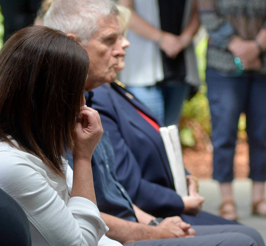 Tricia Flintoft cries during the memorial service for former Tahoma teacher Bill Pringle. Flintoft is a former student of Pringles and is the one who arranged his memorial. Photo by Kayse Angel