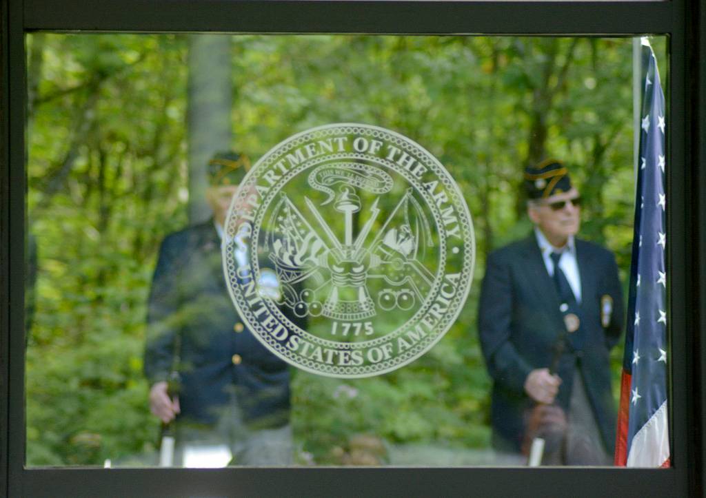 Armed forces wait for their queue to sound gun salute for former Tahoma High teacher Bill Pringle during his memorial on June 25. Photo by Kayse Angel