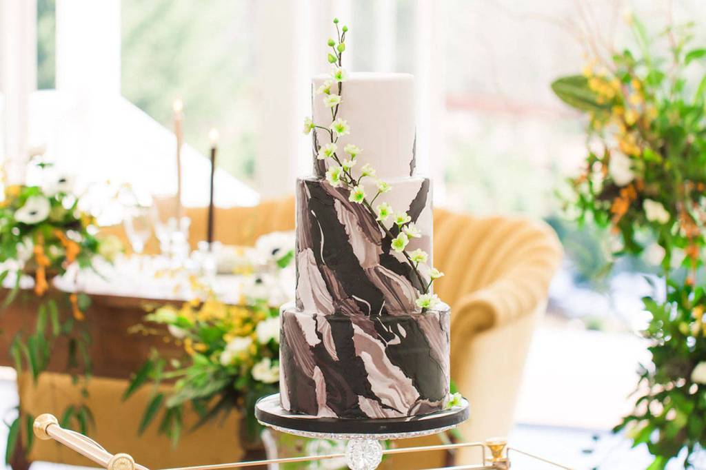 A cake made by Maple Valley resident Lydia Extein. Everything is made from scratch. The flowers and leaves are all edible and made by hand by Extein herself.                                Photo courtesy of Lydias Cakes and Confections