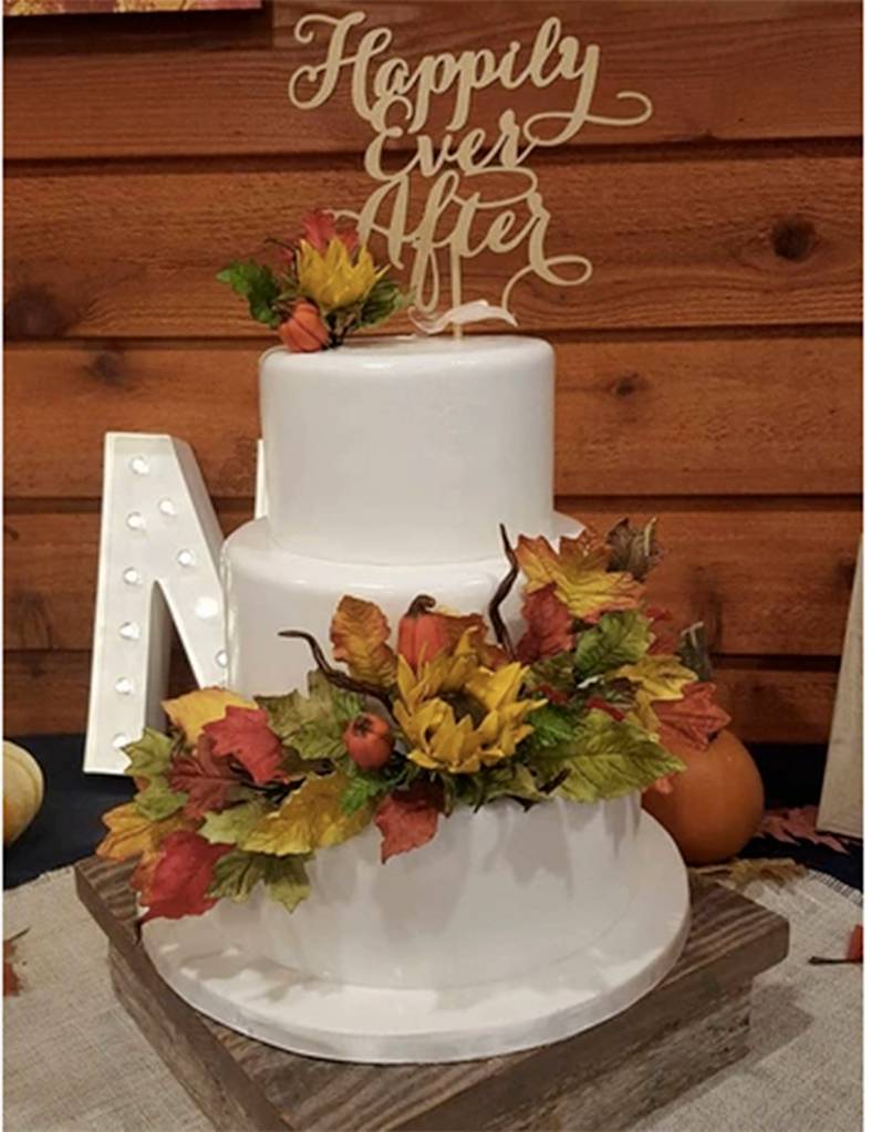 A cake made by Maple Valley resident Lydia Extein. Everything is made from scratch. The flowers and leaves are all edible and made by hand by Extein herself.                                Photo courtesy of Lydias Cakes and Confections
