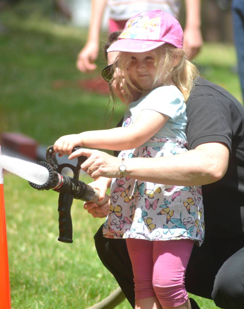 Hazel Erickson completes the Puget Sound Regional Fire Authoritys obstacle course at Maple Valley Kids Fest on July 13.