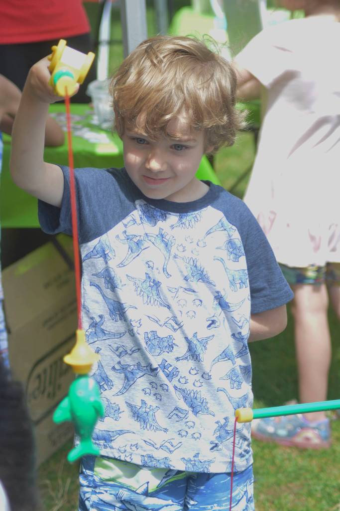 Liam Doyle goes fishing during Maple Valley Kids Fest at Lake Wilderness on July 13.