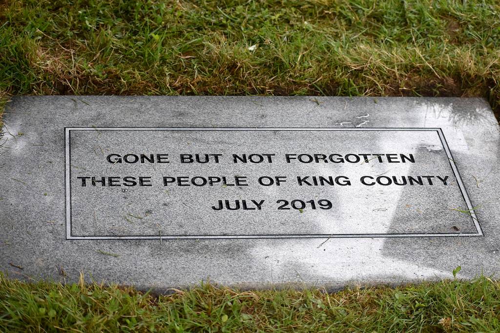 Photo by Haley Ausbun. Hundreds of people who passed away without family to bury them were remembered Wednesday, July 10, at the King County Medical Examiners Office Indigent Remains Ceremony at Mount Olivet Cemetery.