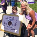 Tina McDonough poses for a picture with Cecile Snyder, a Tahoma Sparkle cheerleader who was diagnosed with lymphoblastic leukemia (ALL). Photo by Kayse Angel