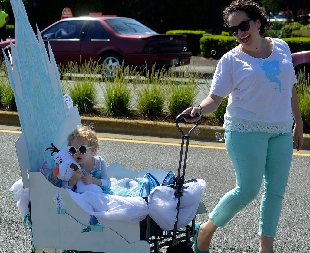 Parade participants march through Covington during the Covington Days Parade on July 20. Photos by Kayse Angel