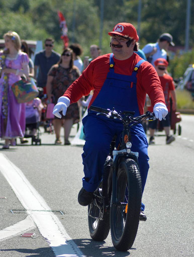 Parade participants march through Covington during the Covington Days Parade on July 20. Photos by Kayse Angel