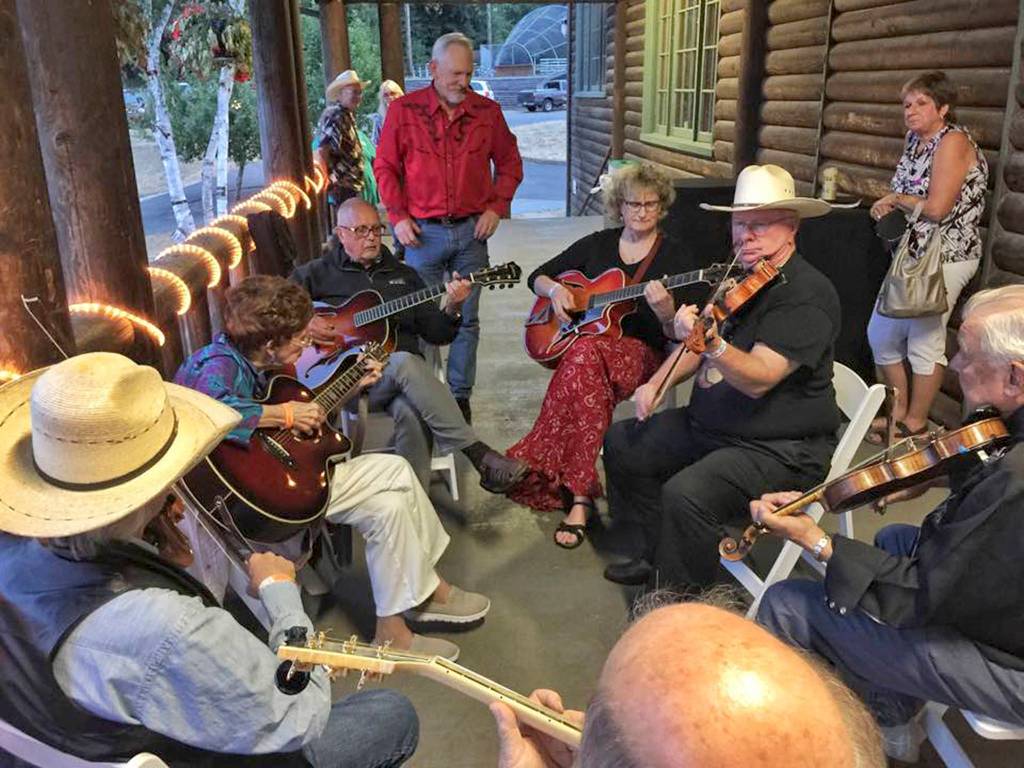Jam sessions outside the Enumclaw Expo Center Field House will be a common sight during the Northwest Western Swing Music Festival, where people can bring their instruments and join in the fun. File photo by Randy Hill, leader of the western swing band, The Oregon Valley Boys.