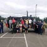 Photos by Danielle Chastaine.                                  Students in the Barbells and Badges summer camp at Cedar Heights Middle School compete on team firefighter or team police on Friday, Aug. 9. Photo courtesy of the Covington Police Department.